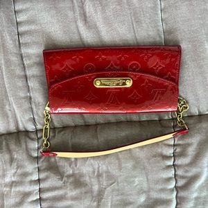 Louis Vuitton clutch red. Rarely worn